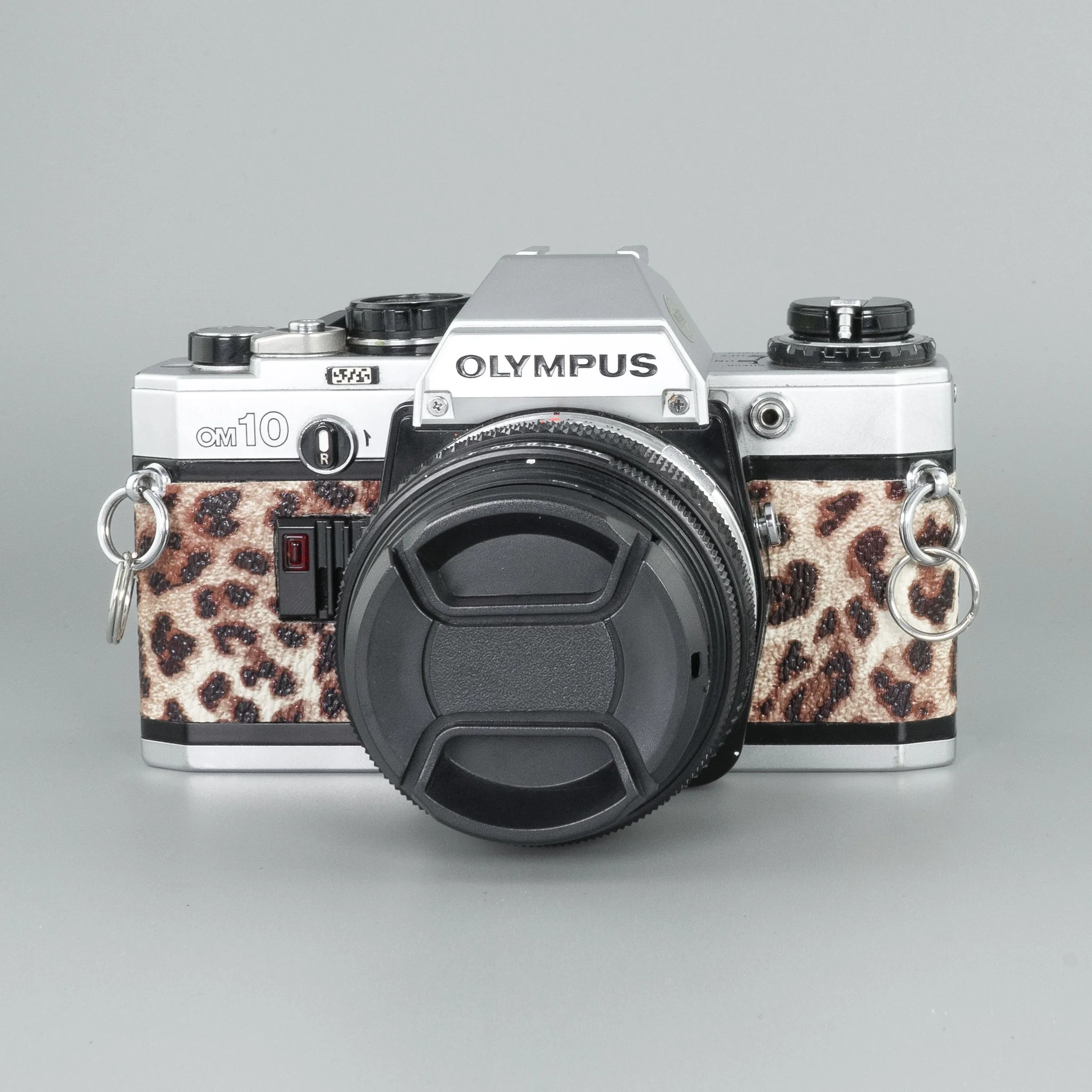 Olympus OM10 (Leopard) - Refurbished 35mm SLR Film Camera — LensFayre